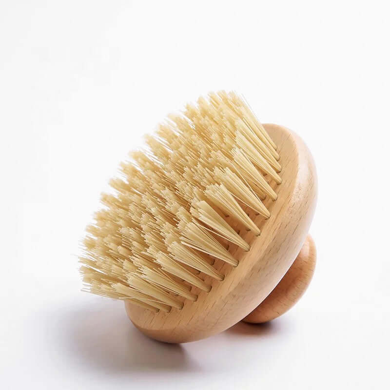 Organic sisal dry body brush with natural bristles for glowing skin and eco-friendly pampering.