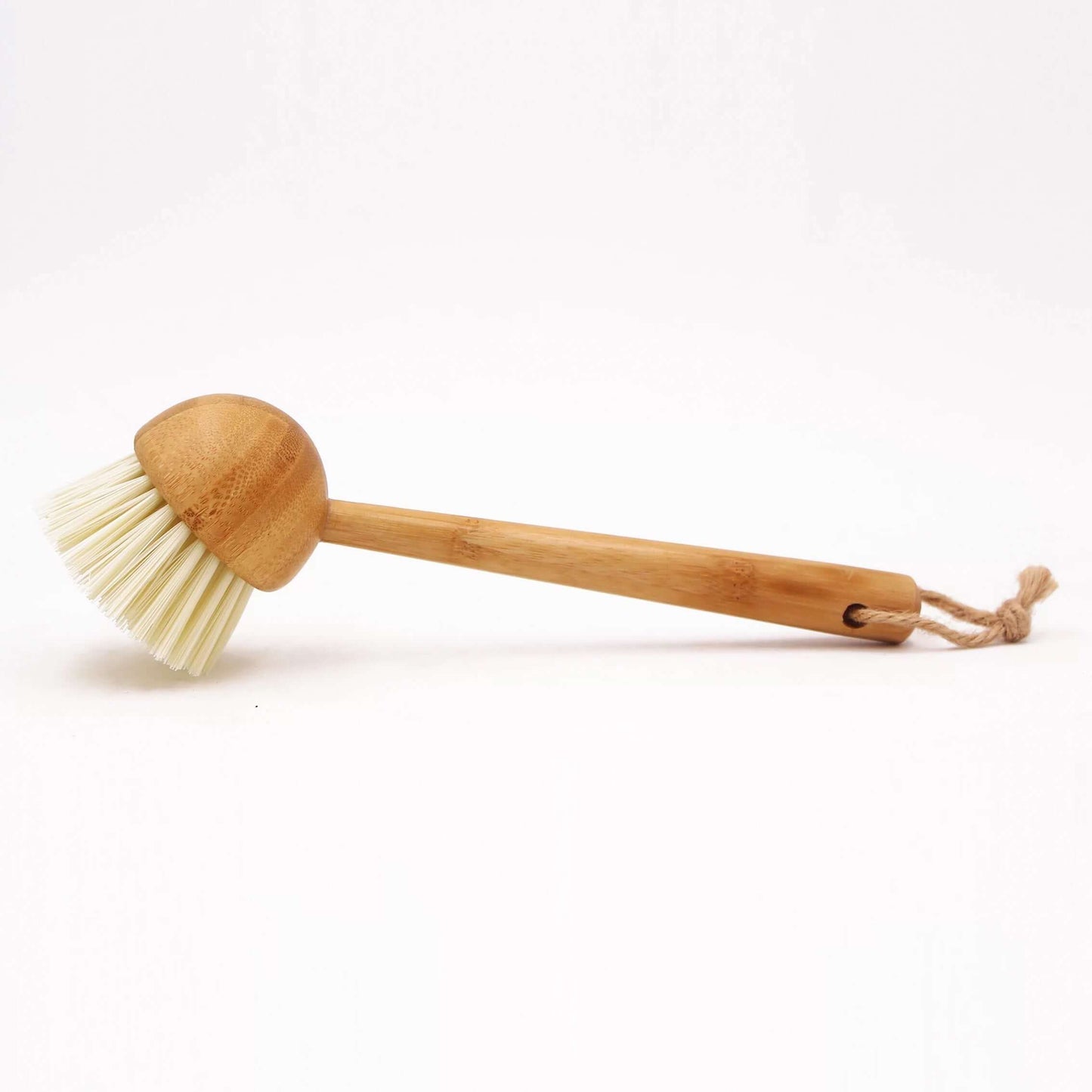 Eco bamboo sisal dish brush with biodegradable material for plastic-free kitchen cleaning.