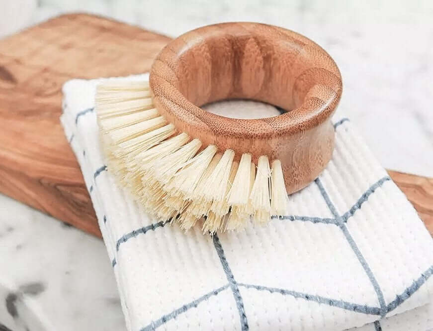 Bamboo Sisal kitchen ring brush on a cloth, eco-friendly, compostable veggie brush for sustainable cooking.
