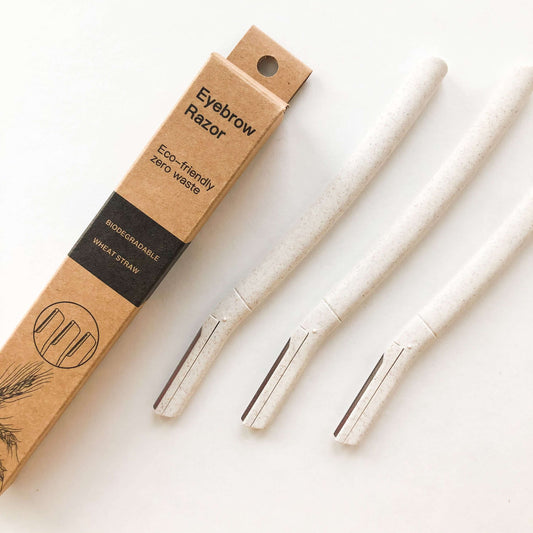Biodegradable wheat straw eyebrow razors packed in eco-friendly packaging for zero waste grooming.