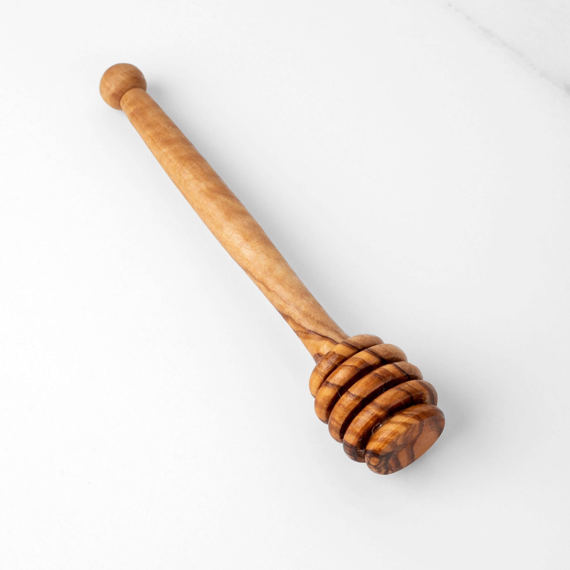 Handmade olive wood honey dipper, eco-friendly drizzler for perfect honey scooping.