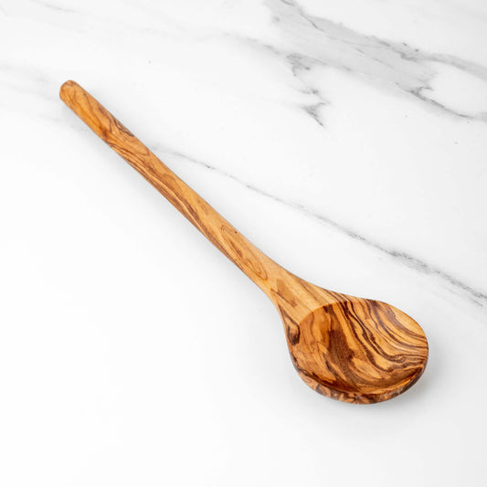Handmade olive wood stirring spoon on marble background, 11.8" durable and eco-friendly kitchen tool.