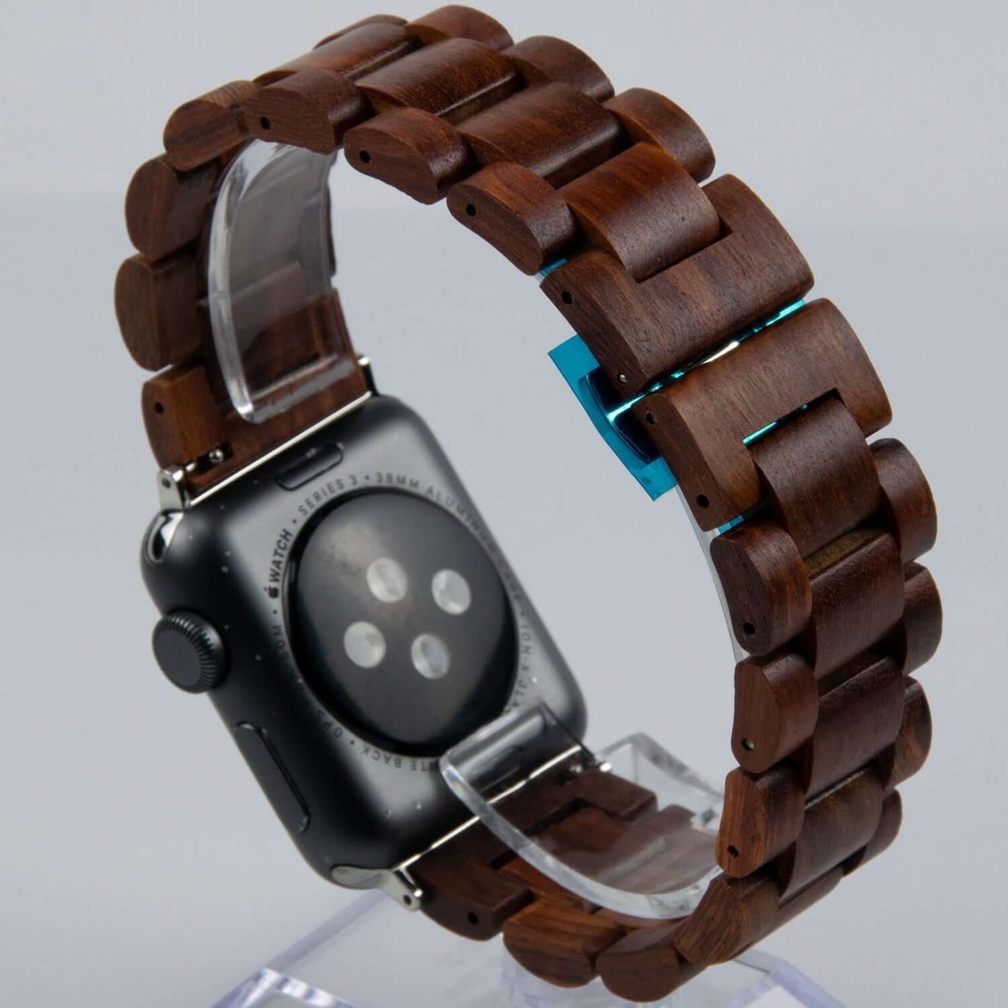 Handmade wooden Apple Watch band made from natural ebony wood, fitting Series 1-8 and SE, showcasing rich color and design.