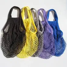 Set of eco-friendly organic cotton mesh bags in vibrant colors including black, yellow, gray, blue, and purple.