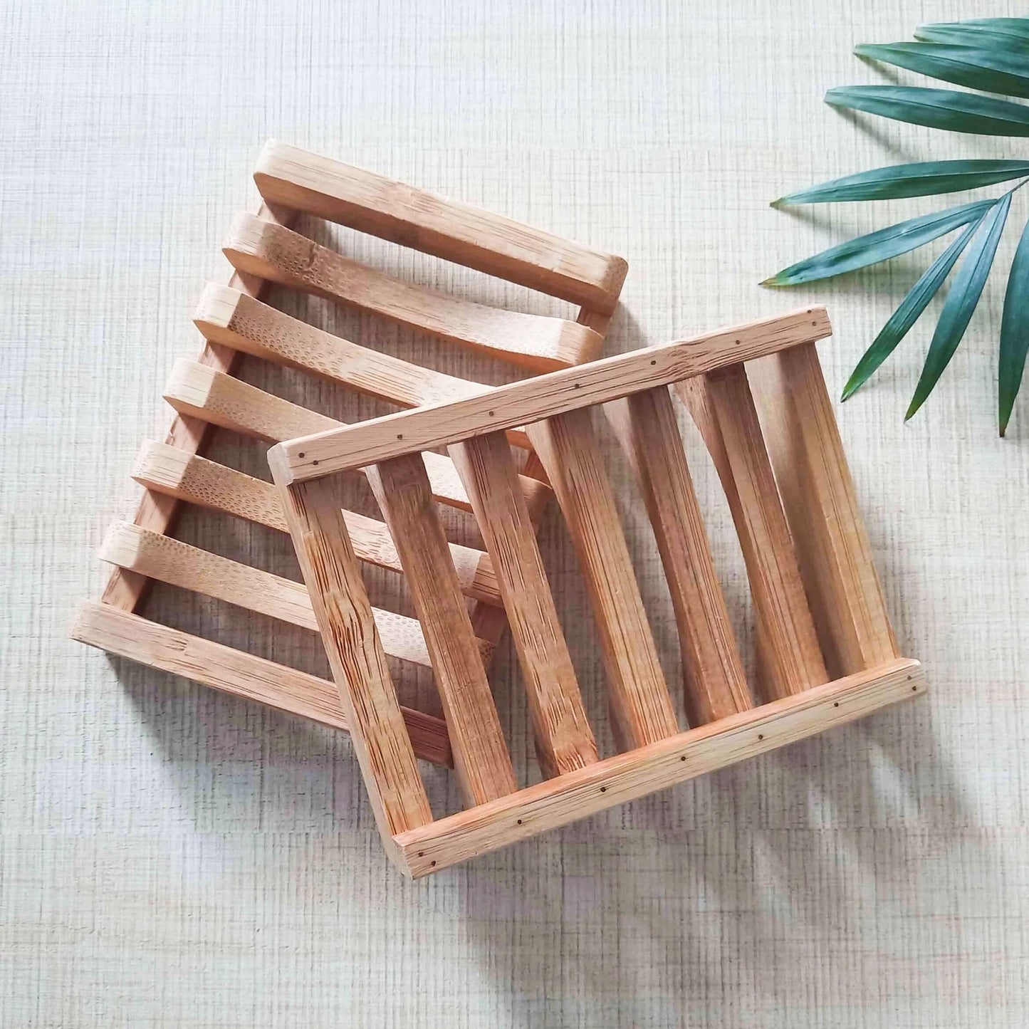 Natural bamboo soap dish for zero waste living, eco-friendly and biodegradable soap tray.
