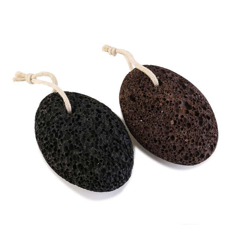 Natural lava stone pumice foot scrubbers in black and brown, ideal for removing calluses and exfoliating feet.