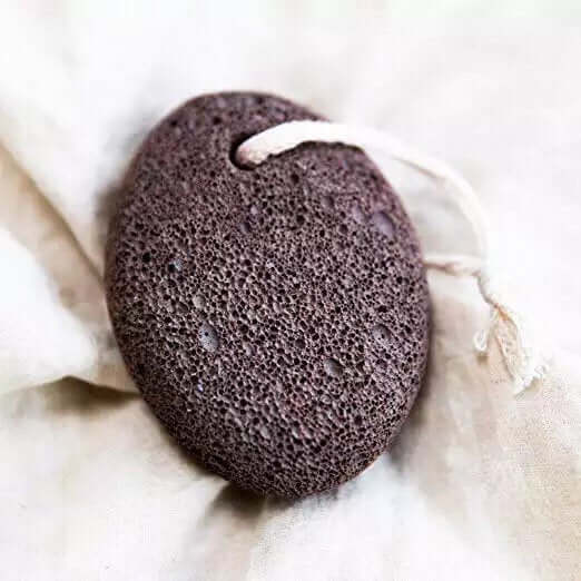Natural lava stone pumice foot scrubber with loop for easy handling, perfect for exfoliating callused skin.