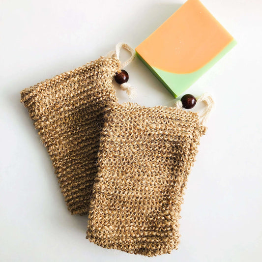 Natural jute soap bags with a bar of soap, perfect for zero waste and gentle skin peeling.