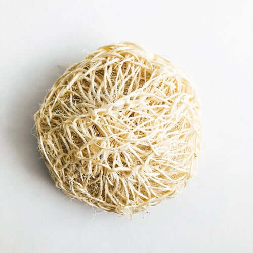 Natural organic sisal deluxe shower sponge for exfoliating skin and reducing cellulite.