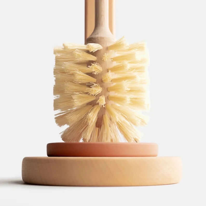 Eco-friendly plastic-free sisal bristles toilet brush with beechwood stand, perfect for sustainable cleaning.