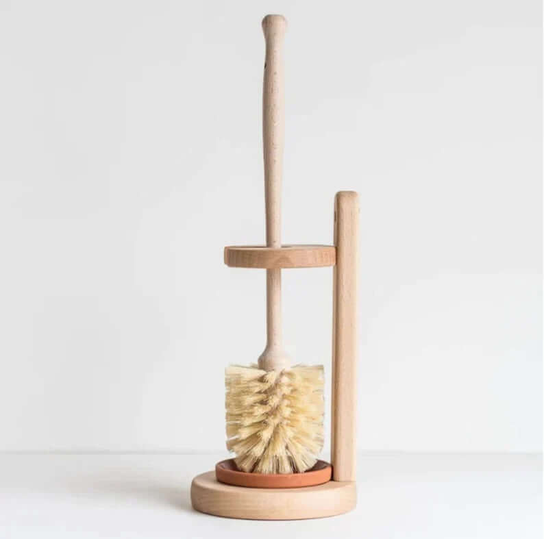 Plastic-free natural sisal bristles toilet brush and stand made from durable beechwood, eco-friendly design.