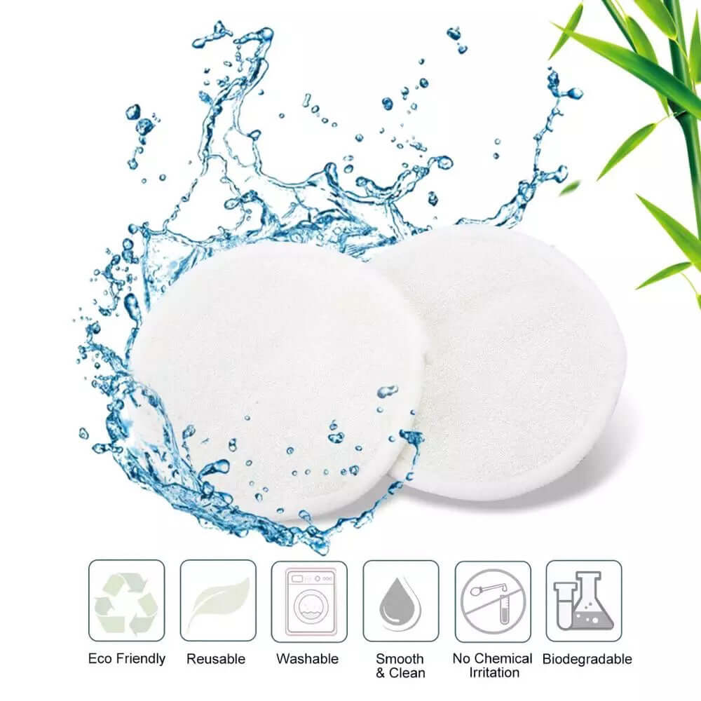 Two eco-friendly reusable bamboo cotton facial pads surrounded by water splashes, highlighting their softness and biodegradability.