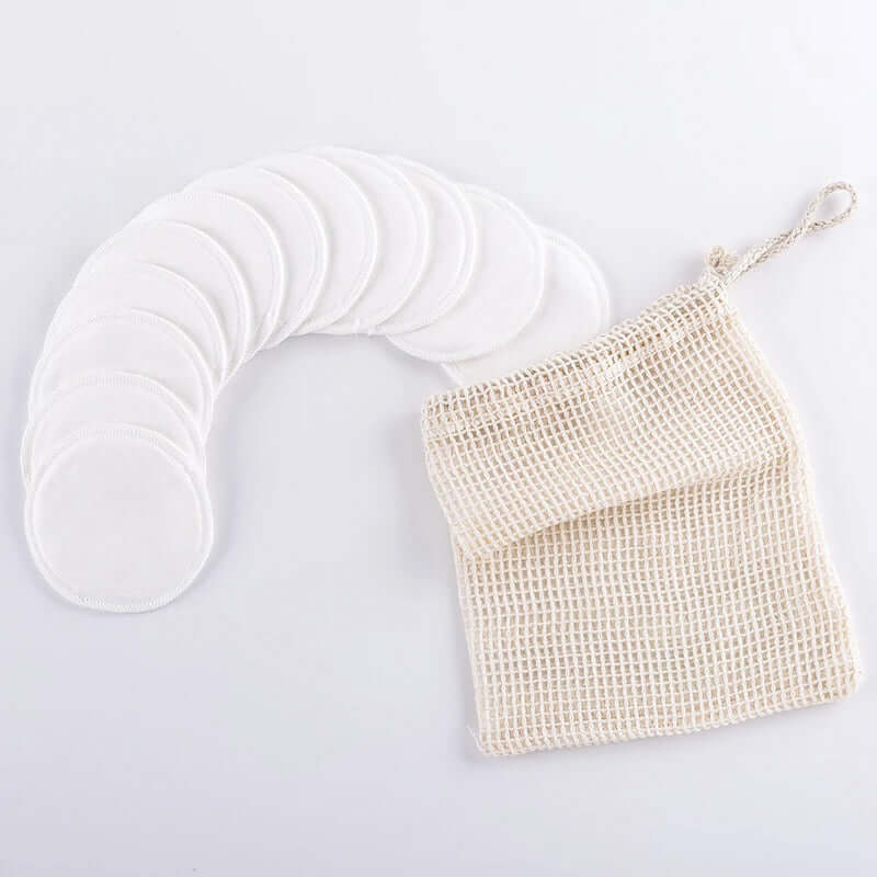 10 organic bamboo cotton facial pads with reusable mesh bag for eco-friendly skincare.