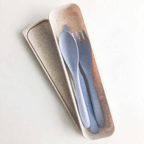 Reusable wheat straw cutlery set in eco-friendly box, featuring spoon, fork, and knife, ideal for sustainable dining.