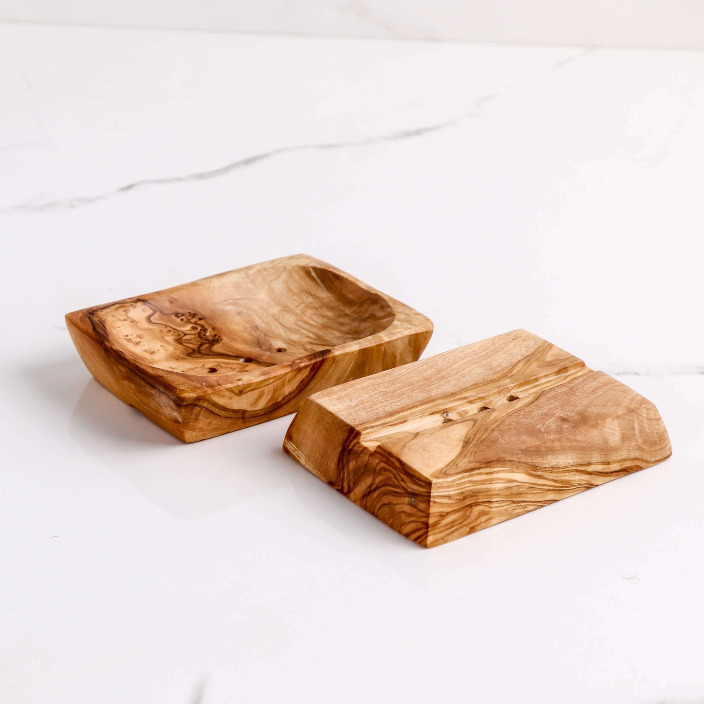 Set of 3 handmade olive wood soap dishes with smooth edges for drying soap.