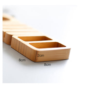 Bamboo desktop organizer block showing dimensions of 8cm x 2cm, perfect for a sustainable workspace solution.