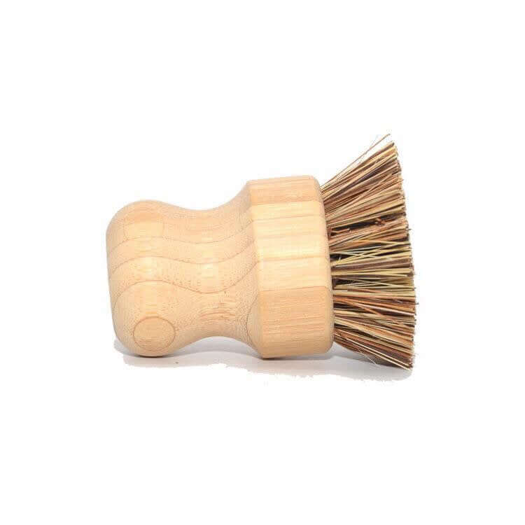 Bamboo pot scrubber brush with natural fiber bristles, ergonomic design for eco-friendly cleaning.