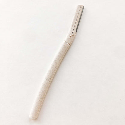 Biodegradable wheat straw eyebrow razor trimmer for eco-friendly beauty and skincare.