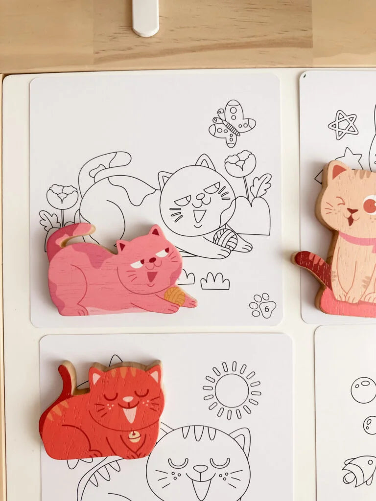 Wooden cats on coloring cards from the Cat Play Set, fostering creativity and imagination in children.