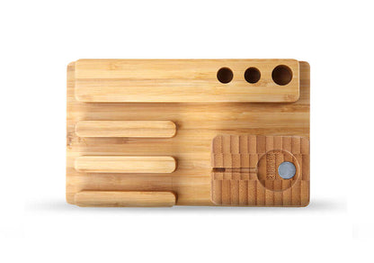 Handcrafted bamboo docking station with 4 USB ports for organized charging of Apple devices.