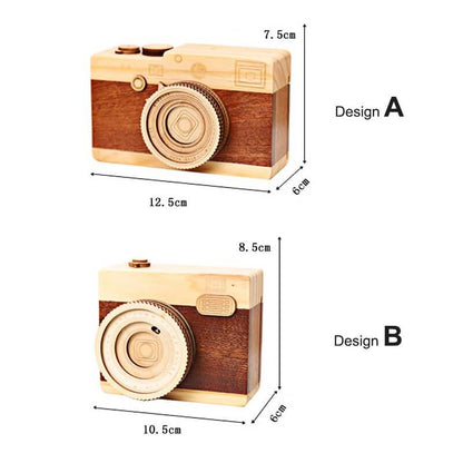Wood Camera Music Box designs A and B, showcasing detailed craftsmanship and compact size.