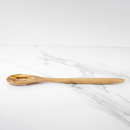 Handmade 35cm olive wood slotted spoon on a marble surface, durable and elegant kitchen utensil for cooking.