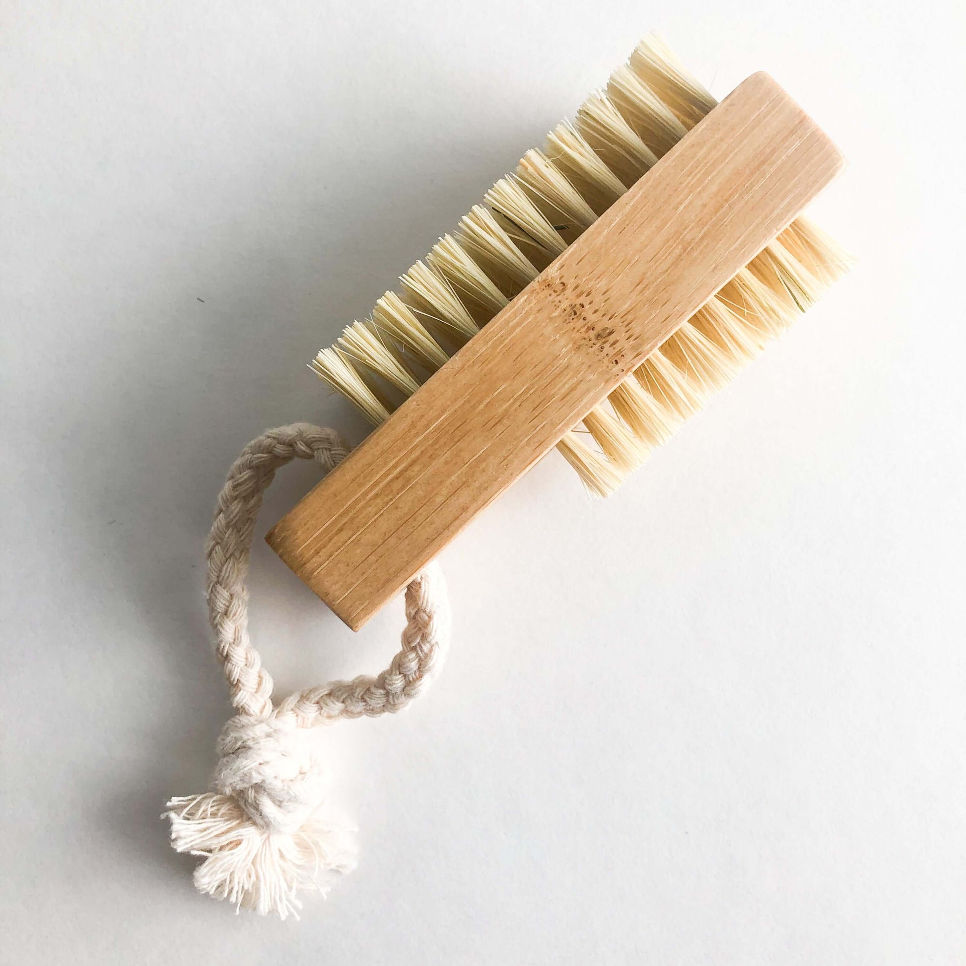 Double sided bamboo sisal nail brush, eco-friendly, plastic-free for clean, zero waste nail care.