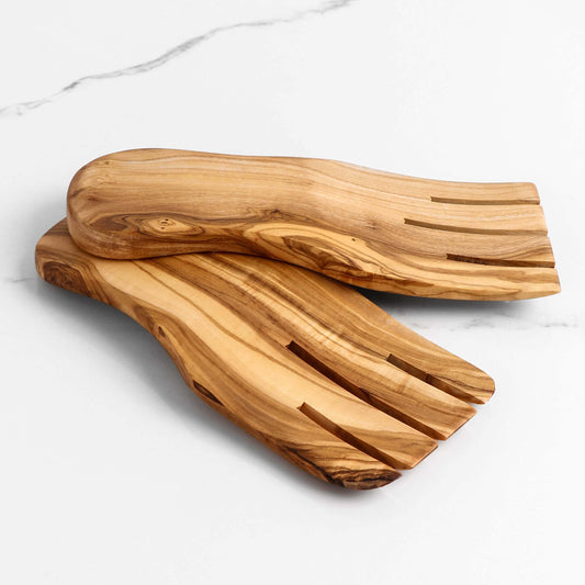 Handmade olive wood salad hands, eco-friendly serving utensils for effortless salad mixing and serving.