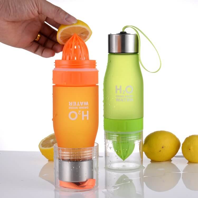 Lemon fruit juicer bottle in orange and green, showcasing dual-function as a juice extractor and water infuser.