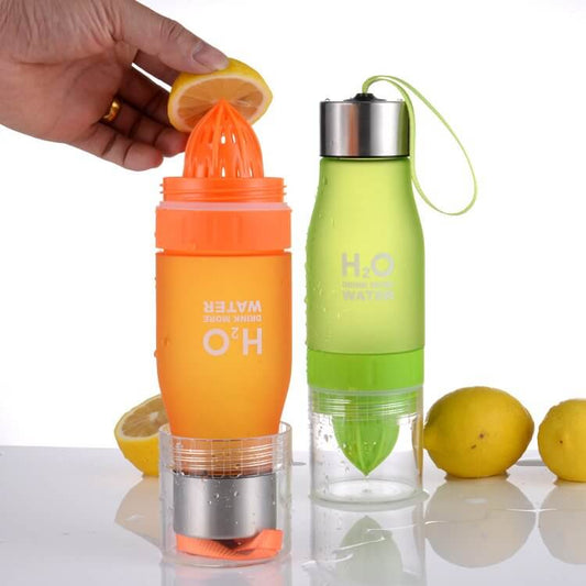 Lemon fruit juicer bottle in orange and green, showcasing dual-function as a juice extractor and water infuser.