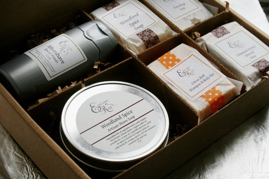 Gift box containing Woodland Spice shave soap, body wash, and several assorted natural soaps.