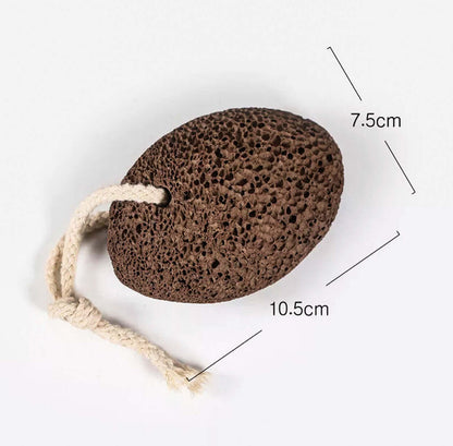 Natural lava stone pumice foot scrubber measures 10.5cm by 7.5cm, ideal for removing calluses and rough skin.