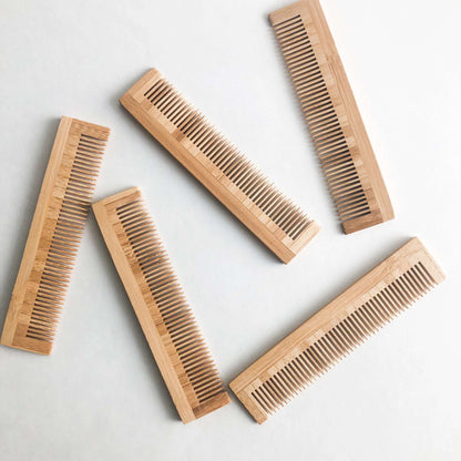 Set of five eco-friendly bamboo combs, plastic-free and gentle on all hair types, ideal for zero waste grooming.