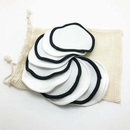 Reusable organic bamboo cotton facial pads in a pouch for eco-friendly skincare and zero waste lifestyle.